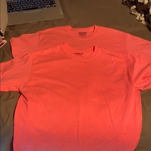 2 neon pink tshirts